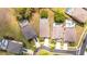 Overhead view of homes with screened-in pools and well-maintained yards in a residential area at 2805 Lido Key Ct, Kissimmee, FL 34747