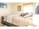Bright bedroom with carpet, neutral walls and a queen size bed with throw pillows at 2805 Lido Key Ct, Kissimmee, FL 34747