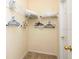 Bright closet with wire shelving, hanging racks, and neutral carpeting at 2805 Lido Key Ct, Kissimmee, FL 34747