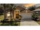 Charming single-Gathering home with a well-manicured lawn and a two-car garage at 2805 Lido Key Ct, Kissimmee, FL 34747