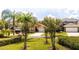 Well-maintained single-Gathering home featuring mature trees and landscaping in a suburban neighborhood at 2805 Lido Key Ct, Kissimmee, FL 34747