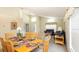 Open living and dining area featuring natural light and comfortable seating arrangements at 2805 Lido Key Ct, Kissimmee, FL 34747