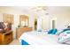 Spacious bedroom featuring neutral colors, a ceiling fan, and a comfortable bed at 2805 Lido Key Ct, Kissimmee, FL 34747