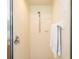 Tiled shower with a shower head and towel rack, perfect for a refreshing experience at 2805 Lido Key Ct, Kissimmee, FL 34747