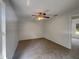 Bedroom showcasing a ceiling fan and neutral carpeting at 3090 Yorkshire Dr, Deltona, FL 32738