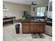 Kitchen with granite countertops, stainless steel appliances, and an adjacent dining area at 3265 Stratton Cir, Kissimmee, FL 34744