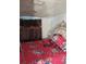 A bedroom featuring a large floral print bed with a large tufted headboard at 332 S Observatory Dr, Orlando, FL 32835