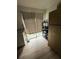 Features wood floors and access to the outdoors with a large window bringing natural light into the kitchen at 332 S Observatory Dr, Orlando, FL 32835