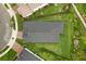 Birds eye view of a meticulously maintained home and lawn in a sidewalk community at 3635 Arbordale Loop, Sanford, FL 32771