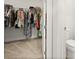 Walk-in closet offering ample storage space for clothes, shoes, and accessories, plus an attached toilet at 3635 Arbordale Loop, Sanford, FL 32771