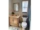 Classic bathroom with a cozy vanity, neutral tones, and all necessary fixtures at 415 Seville Ave, Altamonte Springs, FL 32714