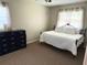 Bedroom with carpet, a ceiling fan, and a large window with natural light at 415 Seville Ave, Altamonte Springs, FL 32714