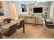 Bright and open living area connected to dining space, showcasing modern decor, neutral tones, and comfortable seating at 415 Seville Ave, Altamonte Springs, FL 32714