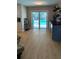 Spacious living area with floor to ceiling sliding glass doors with views of the refreshing pool at 415 Seville Ave, Altamonte Springs, FL 32714