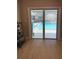 Inviting view of the pool through the sliding glass doors, enhancing the home's appeal at 415 Seville Ave, Altamonte Springs, FL 32714