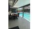 Dine al fresco near the refreshing screened-in pool, perfect for outdoor enjoyment at 415 Seville Ave, Altamonte Springs, FL 32714