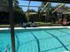Relax poolside in this refreshing screened-in oasis with comfortable seating at 415 Seville Ave, Altamonte Springs, FL 32714