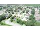 Residential area with mature trees and a mix of houses, some with screened pools at 4906 Keaton Crest Dr, Orlando, FL 32837