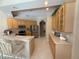 The bright kitchen features modern appliances, a breakfast bar, and ample cabinet space for convenience at 4906 Keaton Crest Dr, Orlando, FL 32837