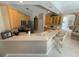Bright kitchen features stainless appliances and breakfast bar for a modern and functional space at 4906 Keaton Crest Dr, Orlando, FL 32837