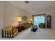 A comfortable living room with plush furniture and a view of the backyard at 4906 Keaton Crest Dr, Orlando, FL 32837