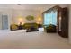 Inviting living room featuring vintage furniture and large windows at 4906 Keaton Crest Dr, Orlando, FL 32837