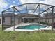 Backyard pool is screened-in with a patio area ideal for entertaining at 4906 Keaton Crest Dr, Orlando, FL 32837