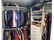 Well-organized walk-in closet with ample shelving, hanging rods, and storage space at 525 Southport Dr, Longwood, FL 32750