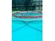 An in-ground hot tub with decorative glass blocks at 525 Southport Dr, Longwood, FL 32750