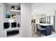 Well-designed kitchen area with custom cabinetry, a microwave, and easy access to adjacent living and dining areas at 525 Southport Dr, Longwood, FL 32750