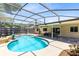 Beautiful screened-in pool with a spa, fountain, and covered patio for outdoor entertaining at 525 Southport Dr, Longwood, FL 32750