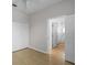 Bedroom featuring tile floor, a ceiling fan and a closet that leads to another room at 548 Casterton Cir, Davenport, FL 33897