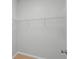 Walk-in closet with built-in shelving and hanging rods for storage at 548 Casterton Cir, Davenport, FL 33897