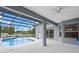 Relaxing pool area enclosed with a screen, offering a perfect outdoor retreat at 548 Casterton Cir, Davenport, FL 33897
