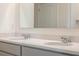 Bathroom featuring double sinks, hard surface countertops, and modern faucets at 5896 Galloping Dr, Apopka, FL 32712