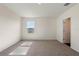 Spacious bedroom featuring carpet and a window for natural light at 5896 Galloping Dr, Apopka, FL 32712
