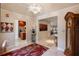 Spacious foyer featuring marble flooring, decorative lighting, and a view into the kitchen at 5973 Chesapeake Park # 58, Orlando, FL 32819