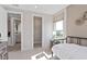 Comfortable bedroom offers a walk-in closet and access to a bathroom at 6035 Blue View Way, St Cloud, FL 34771
