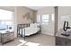 Cozy bedroom featuring ample natural light, neutral color scheme, and comfortable furnishings at 6035 Blue View Way, St Cloud, FL 34771