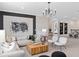 Inviting living room featuring modern decor, neutral color palette, and comfortable seating arrangement at 6035 Blue View Way, St Cloud, FL 34771