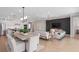 Open-concept living space features a dining area connected to the living room and kitchen at 6035 Blue View Way, St Cloud, FL 34771