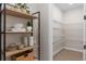 Walk-in pantry features open shelving and provides ample storage space at 6035 Blue View Way, St Cloud, FL 34771