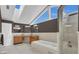 Bathroom with double sink vanity, soaking tub, glass shower, and large skylight at 605 Macglenross Dr, Oviedo, FL 32765
