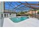 The screen enclosed pool area includes a garden, patio, and privacy at 605 Macglenross Dr, Oviedo, FL 32765