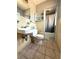 Functional bathroom featuring a vanity with a sink, tile flooring, and a shower/tub combo with a curtain at 6615 Beamer Way, Orlando, FL 32807