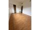 Spacious bedroom with hardwood floors and ample closet space at 6615 Beamer Way, Orlando, FL 32807