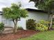 Exterior view of house, plants, and landscaping at 6615 Beamer Way, Orlando, FL 32807