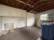 Unfinished room with ample storage and exposed ceilings at 6615 Beamer Way, Orlando, FL 32807