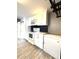 Well-lit kitchen with stainless steel appliances and a modern design aesthetic at 6615 Beamer Way, Orlando, FL 32807