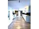 A newly renovated kitchen with modern appliances, tile flooring, and stylish cabinetry at 6615 Beamer Way, Orlando, FL 32807